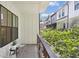 Charming balcony with a view of neighboring homes and lush greenery, perfect for relaxation at 321 Dilbeck Ne Cir, Atlanta, GA 30342
