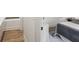 Bright bedroom featuring wood floors, neutral walls, and a stylishly decorated bed with gray and white bedding at 321 Dilbeck Ne Cir, Atlanta, GA 30342