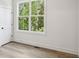 Bright bedroom with a large window providing ample natural light, enhancing the serene and inviting atmosphere at 321 Dilbeck Ne Cir, Atlanta, GA 30342