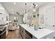 Modern kitchen with island, quartz countertop, and hardwood floors at 321 Dilbeck Ne Cir, Atlanta, GA 30342