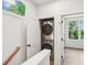 Functional laundry area with stacked washer and dryer, offering convenience and space-saving design at 321 Dilbeck Ne Cir, Atlanta, GA 30342