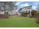 A spacious backyard features a lush green lawn and a deck, perfect for outdoor enjoyment at 4165 Azurite St, Cumming, GA 30040