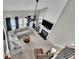 Aerial view of a living room with comfortable seating, fireplace and a ceiling fan at 4165 Azurite St, Cumming, GA 30040