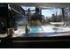 Unwind in the hot tub complete with wine, glasses, and a view of the outdoor TV at 5890 Kayron Dr, Atlanta, GA 30328