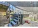 Enjoy the shaded hot tub area with an outdoor TV and convenient access from the deck at 5890 Kayron Dr, Atlanta, GA 30328