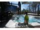 Relax by the hot tub, with a bottle of wine and an outdoor TV setup at 5890 Kayron Dr, Atlanta, GA 30328