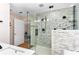 Stylish bathroom featuring a modern shower with gray-scale tiling and a sleek vanity at 6604 Destiny Se Dr, Mableton, GA 30126