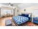 Comfortable bedroom showcases a queen bed, stylish rug, and a pair of cozy chairs by the window at 6604 Destiny Se Dr, Mableton, GA 30126