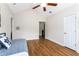 Spacious bedroom showcases a ceiling fan, vaulted ceiling, and versatile living space at 6604 Destiny Se Dr, Mableton, GA 30126