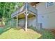 The backyard features an elevated deck, a playground, and a modern AC unit for comfortable outdoor living at 1453 Midview Dr, Decatur, GA 30032