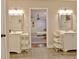 En suite bathroom features a double vanity and is connected to the finished basement at 1453 Midview Dr, Decatur, GA 30032