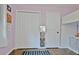 Bedroom featuring hardwood floors, light purple walls with built-in shelves at 1453 Midview Dr, Decatur, GA 30032