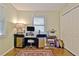 A bedroom with a desk, window and double closet perfect for storage and an office at 1453 Midview Dr, Decatur, GA 30032
