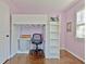 Bedroom featuring hardwood floors, a loft bed, desk, and soft, natural light at 1453 Midview Dr, Decatur, GA 30032
