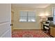 Bedroom with a large window and a desk for the perfect office or bedroom combination at 1453 Midview Dr, Decatur, GA 30032