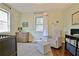 Cozy Bedroom featuring hardwood floors, soothing wall color, and comfortable glider chair at 1453 Midview Dr, Decatur, GA 30032