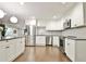 Bright kitchen featuring white cabinets, stainless steel appliances, and modern fixtures at 1453 Midview Dr, Decatur, GA 30032