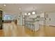 Open kitchen with a central island, stainless steel appliances, and pendant lighting at 1453 Midview Dr, Decatur, GA 30032