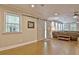 Living room featuring wood floors, barn doors, large windows, and a cozy seating area at 1453 Midview Dr, Decatur, GA 30032