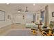 Spacious and versatile living room with a projector, ample lighting, and comfortable lounge seating at 1453 Midview Dr, Decatur, GA 30032
