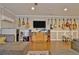 Entertainment room with guitars, storage and large TV at 1453 Midview Dr, Decatur, GA 30032