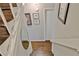 Close up of the wooden stairway with a white banister leading to the upper level at 1453 Midview Dr, Decatur, GA 30032