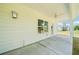 Covered patio with ceiling fan looking out into backyard at 1471 Stephens View Dr, Loganville, GA 30052