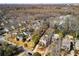 Aerial view of the neighborhood, highlighting a mix of houses and mature trees at 1828 Almeta Ne Ave, Atlanta, GA 30307