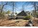 Backyard area featuring a trampoline and stone retaining wall at 1828 Almeta Ne Ave, Atlanta, GA 30307