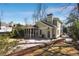 Charming backyard featuring a screened-in porch, patio, and well-maintained lawn at 1828 Almeta Ne Ave, Atlanta, GA 30307