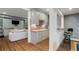 Finished basement featuring a modern kitchenette, bar area, and cozy living space with built-in shelving at 1828 Almeta Ne Ave, Atlanta, GA 30307