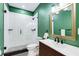 Modern bathroom featuring a walk-in shower, stylish vanity, and contemporary fixtures at 1828 Almeta Ne Ave, Atlanta, GA 30307