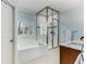 Bright and airy bathroom featuring a soaking tub, glass-enclosed shower, and modern fixtures for a spa-like experience at 1828 Almeta Ne Ave, Atlanta, GA 30307