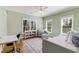 Bedroom featuring natural light, hardwood floors, neutral colored walls and a ceiling fan at 1828 Almeta Ne Ave, Atlanta, GA 30307