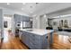 Spacious kitchen featuring a large island, stainless steel appliances, and an open concept design at 1828 Almeta Ne Ave, Atlanta, GA 30307