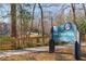 Lake Claire Park sign and entrance, framed by trees and landscaping at 1828 Almeta Ne Ave, Atlanta, GA 30307