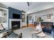 Comfortable living room featuring a fireplace, built-in shelves and an open floor plan at 1828 Almeta Ne Ave, Atlanta, GA 30307
