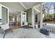 Inviting screened porch with view to interior kitchen and outdoor greenery, offering a serene space for relaxation at 1828 Almeta Ne Ave, Atlanta, GA 30307