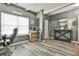 Office space with grey vinyl floors, grey walls, desk, and office chair at 212 Long Dr, Mcdonough, GA 30253