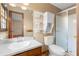 Bathroom features a vanity, toilet, and walk-in shower at 2696 Titon Way, Lawrenceville, GA 30044
