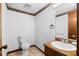 Bathroom featuring a vanity and toilet at 2696 Titon Way, Lawrenceville, GA 30044