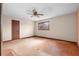 Spacious bedroom with a ceiling fan and window letting in natural light at 2696 Titon Way, Lawrenceville, GA 30044