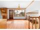 Dining room with hardwood floors, bright windows, a chandelier, and staircase at 2696 Titon Way, Lawrenceville, GA 30044