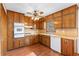 Bright kitchen with wooden cabinets, lots of counter space and modern appliances at 2696 Titon Way, Lawrenceville, GA 30044