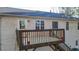 Backyard view of elevated deck and door access at 148 White Pine Ln, Temple, GA 30179