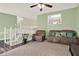 Comfortable living room featuring an open staircase and plush seating at 148 White Pine Ln, Temple, GA 30179