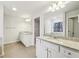 Stylish bathroom with double vanity, granite countertops, and modern fixtures at 3603 Squires Park Ln, Loganville, GA 30052