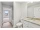 Bathroom features granite countertops, white cabinets, and a neutral color palette at 1461 Stephens View Dr, Loganville, GA 30052