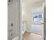 Bathroom design with modern fixtures, granite countertops, and easy access to an adjacent bedroom at 1461 Stephens View Dr, Loganville, GA 30052