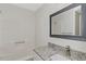 Bright bathroom with modern finishes and granite countertops at 6304 Marbut Farms Ln, Lithonia, GA 30058